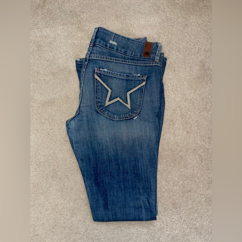 People’s Liberation 
Bellbottom jeans 
size 31 
Distressed  
Smoke free